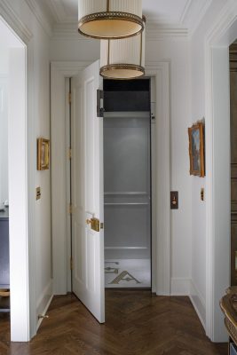 The addition of an elevator is one of the modern upgrades to the home, featuring elaborate tile work on the floor in the monogram “GA” for Glen Arden