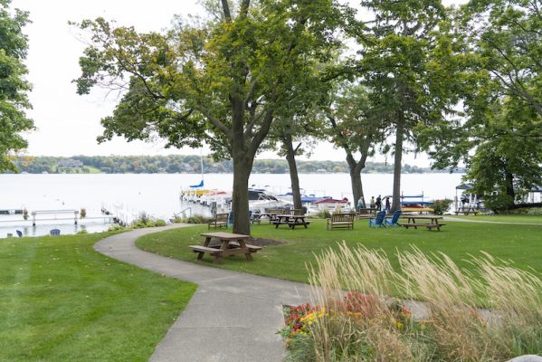 The lakefront community park was part of the original front lawn of Linden Lodge. Today it is a popular gathering spot for the community. 
Photo by Holly Leitner.