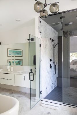 Bathroom trends include luxury walk-in showers with multiple showerheads.  Photo by Shanna Wolf.