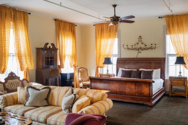 Guest accommodation options include rooms in the stables as well as richly appointed spaces in the main house.