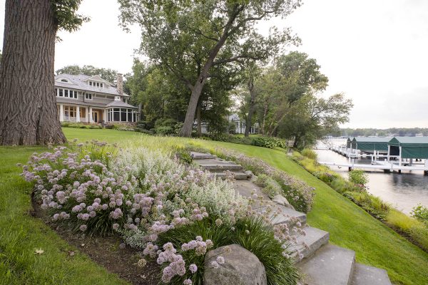 Low-growing native plants provide a soft look to the front yard without obstructing the lake view.
