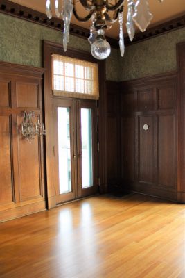 The rich tones of the oak paneling created a marked contrast with the airiness of the rest of the home.  Photo courtesy of Geneva Lake Museum