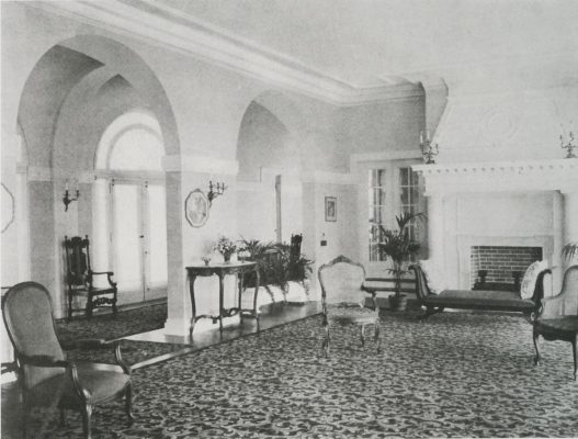 A large stone fireplace originally kept the home warm in the spring and autumn and on chilly summer days.  Photo courtesy Geneva Lake Museum.