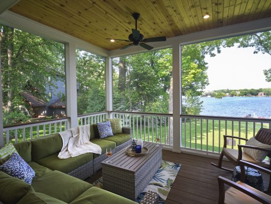 The Storandts say the home’s screened porch is a highlight, providing a cool and breezy space to enjoy views of Mill Lake. 