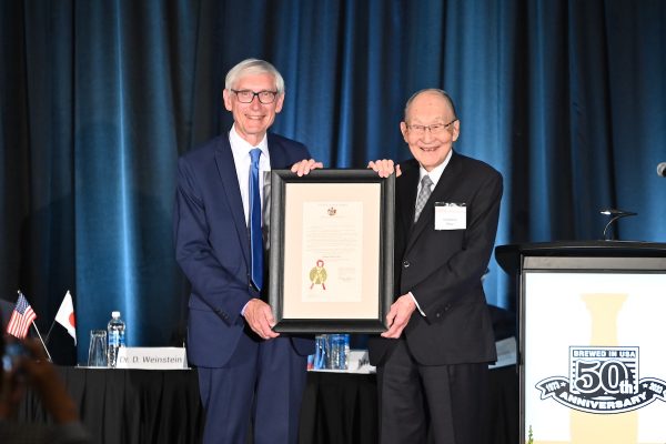 Wisconsin Gov. Tony Evers presents a proclamation to Honorary CEO Mogi recognizing June 9, 2023, as “Kikkoman Day” in Wisconsin.  Photo courtesy of Kikkoman Foods Inc.