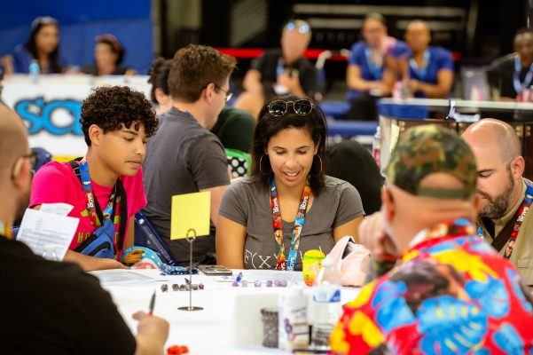 Attendees at Gen Con
2023 play a game of Dungeons & Dragons.  Photo courtesy of Gen Con LLC