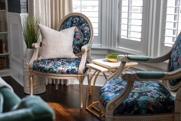 Unexpectedly, the Horchow Peacock chairs in the living room became a design inspiration for the house.